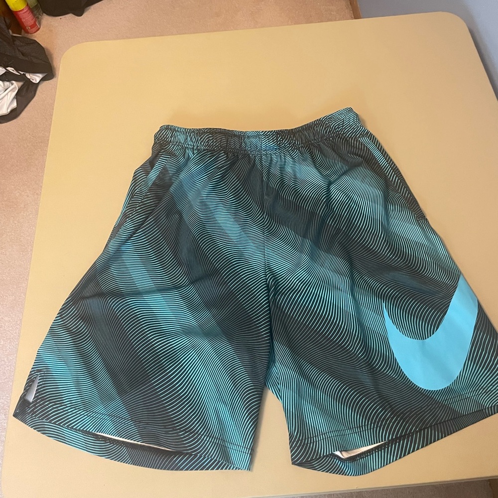 Teal Nike Dri-fit blue abstract jumbo swoosh shorts with drawstrings